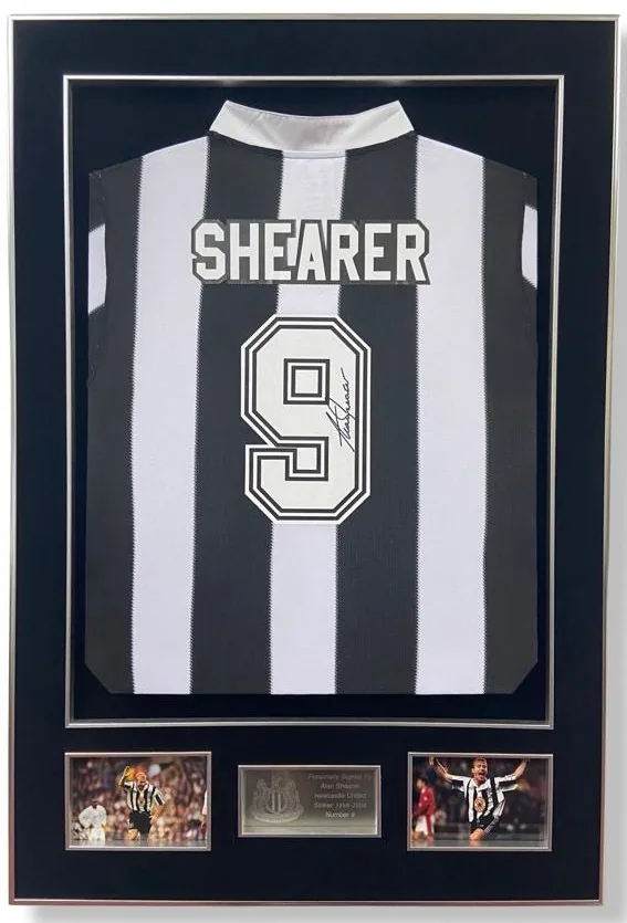 Alan Shearer — signed Newcastle United shirt (collared, silver frame) — authentic signed memorabilia, framed