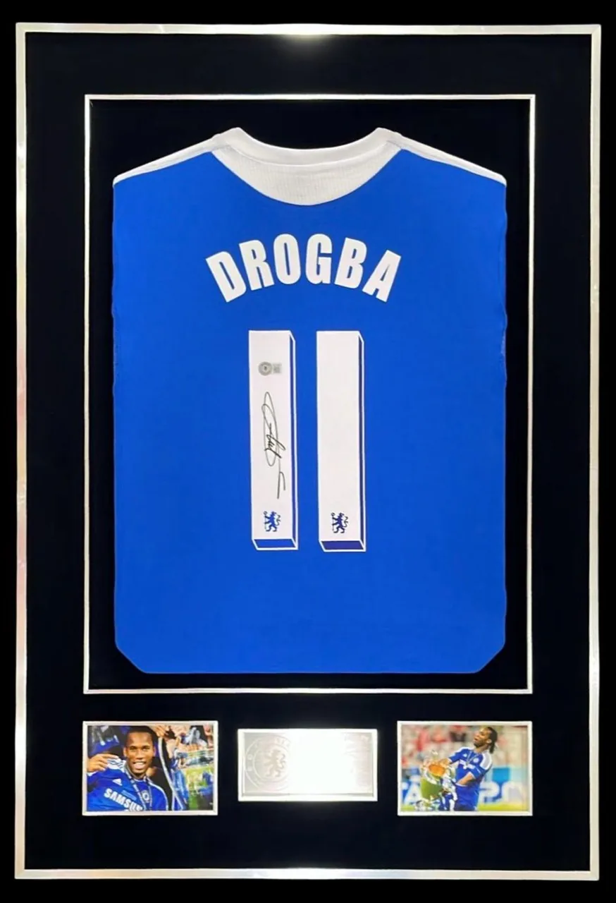 Didier Drogba — signed Chelsea shirt (silver frame) — memorabilia bertanda tangan asli dalam bingkai