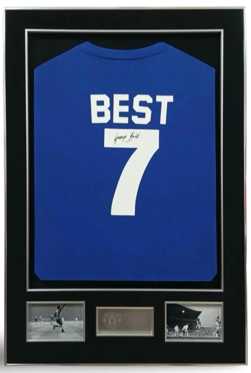 George Best — signed Manchester United away shirt — memorabilia bertanda tangan asli dalam bingkai