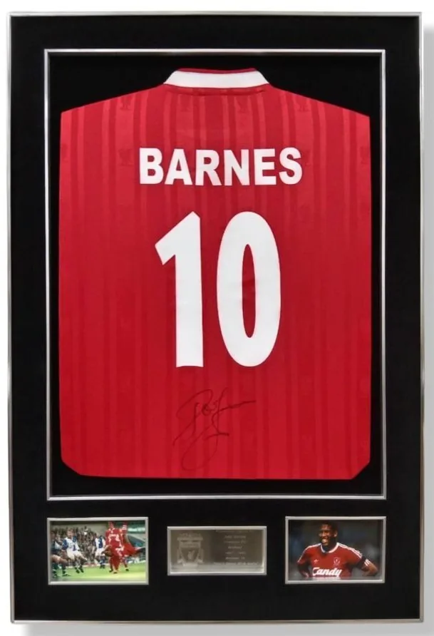 John Barnes — signed Liverpool shirt (red collar, silver frame) — authentic signed memorabilia, framed