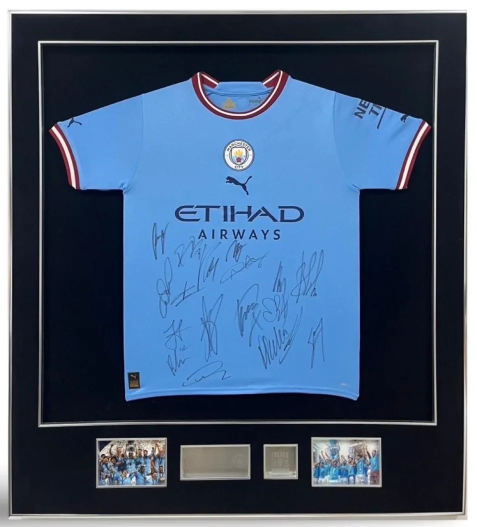 Manchester City — squad-signed shirt — authentic signed memorabilia, framed